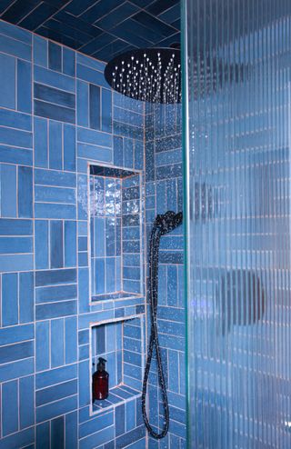 stacked blue shower tiles