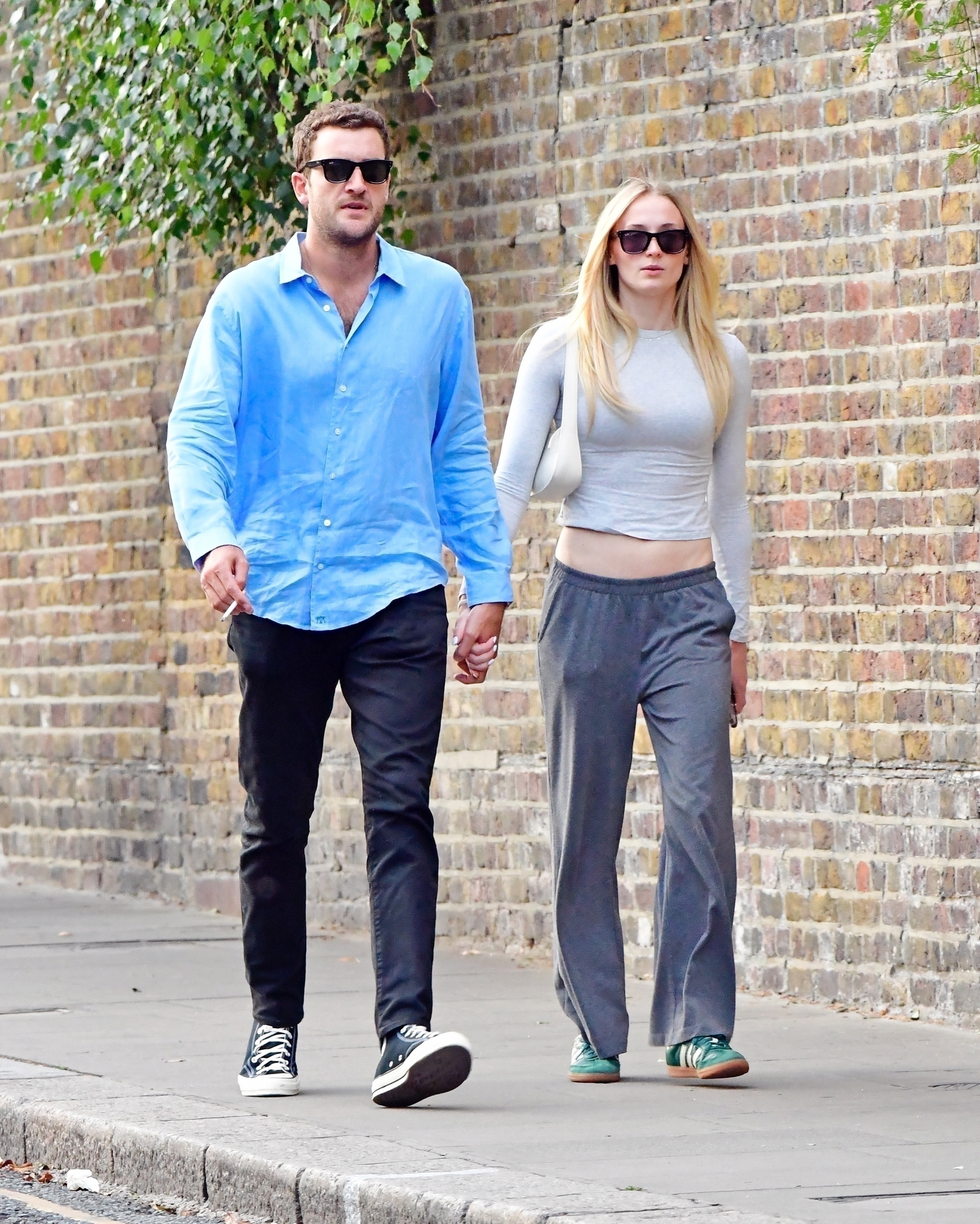 Sophie Turner wore leather green Adidas Sambas with an off-duty groutfit in Notting Hill