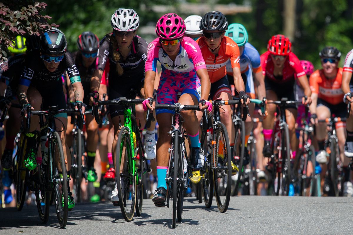 Riders fight for shade along the course