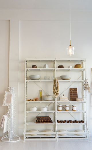 white shelf with crockery