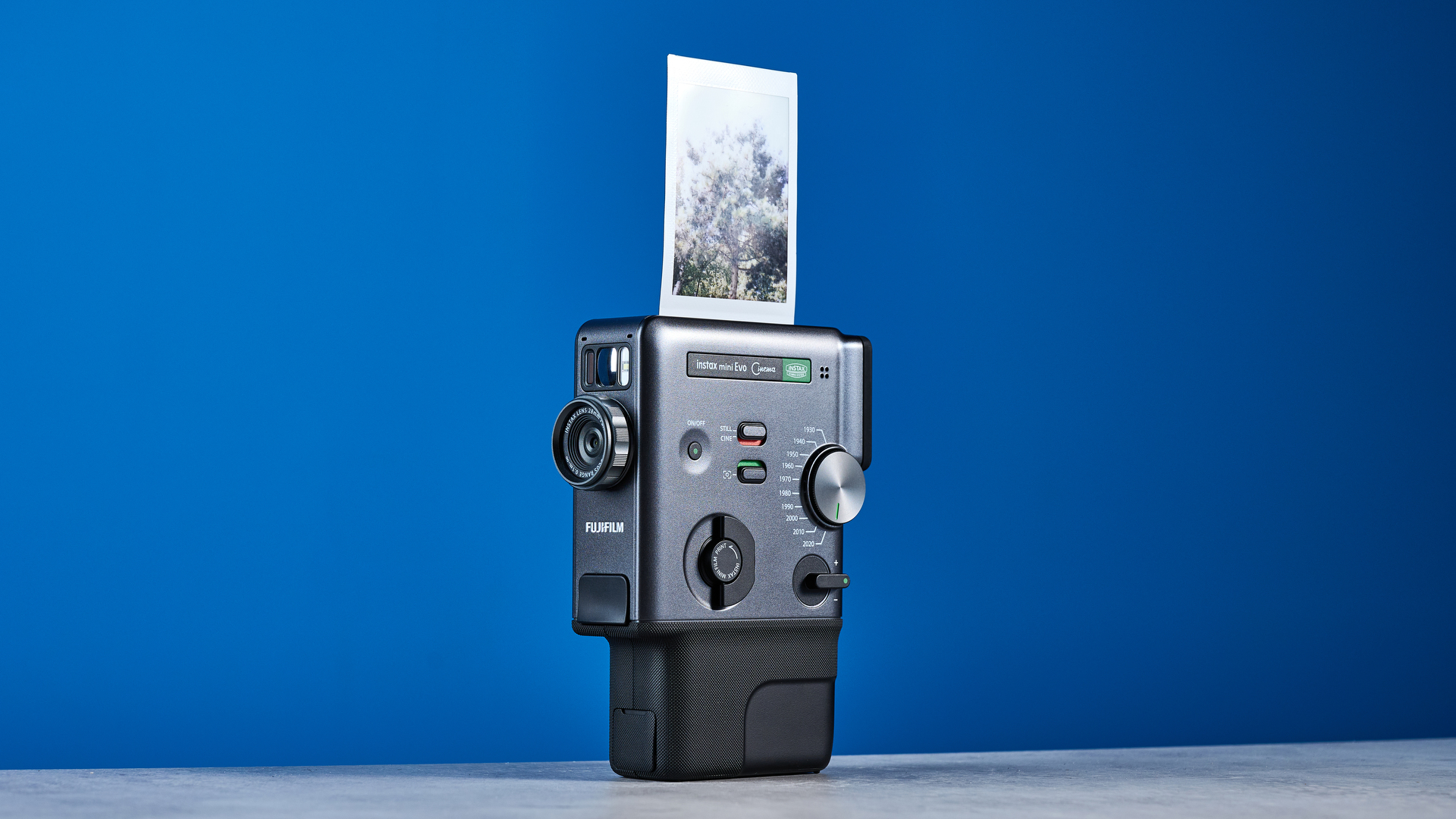 A Fujifilm Instax mini Evo Cinema hybrid instant camera