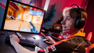 A Fnatic player wearing the Sony Inzone H9 II headset while playing Valorant.