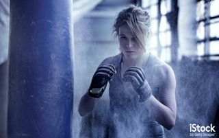 Female Boxer in an Abandoned Warehouse by Lorado