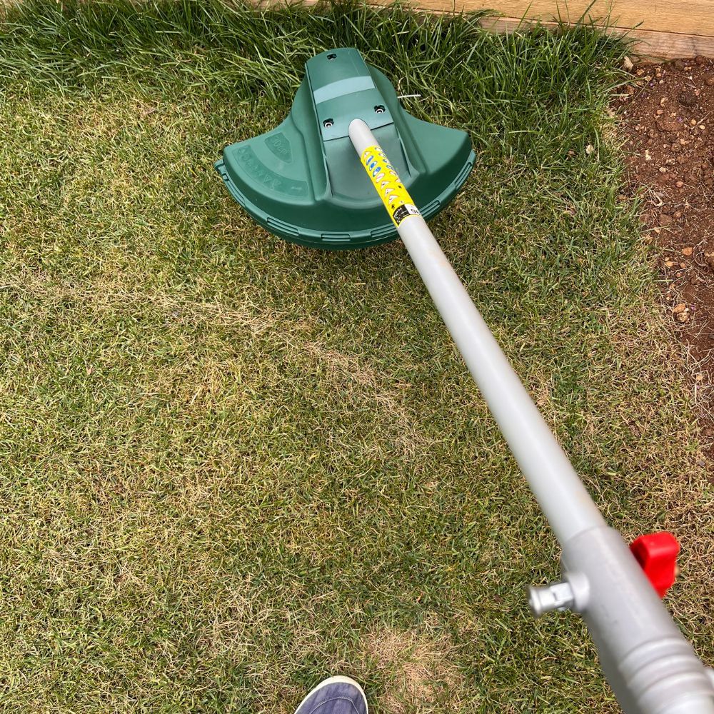 before grass strimming with the webb multi tool