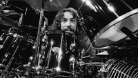 Neil Peart behind his drum kit, 1977