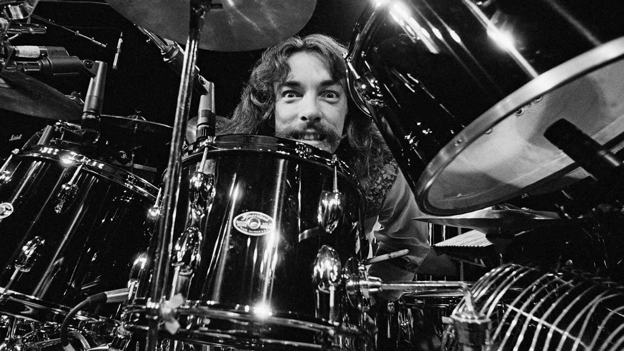 Neil Peart behind his drum kit, 1977