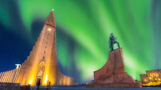 Aurora borealis above Hallgrimskirkja church in central of Reykjavik city in Iceland