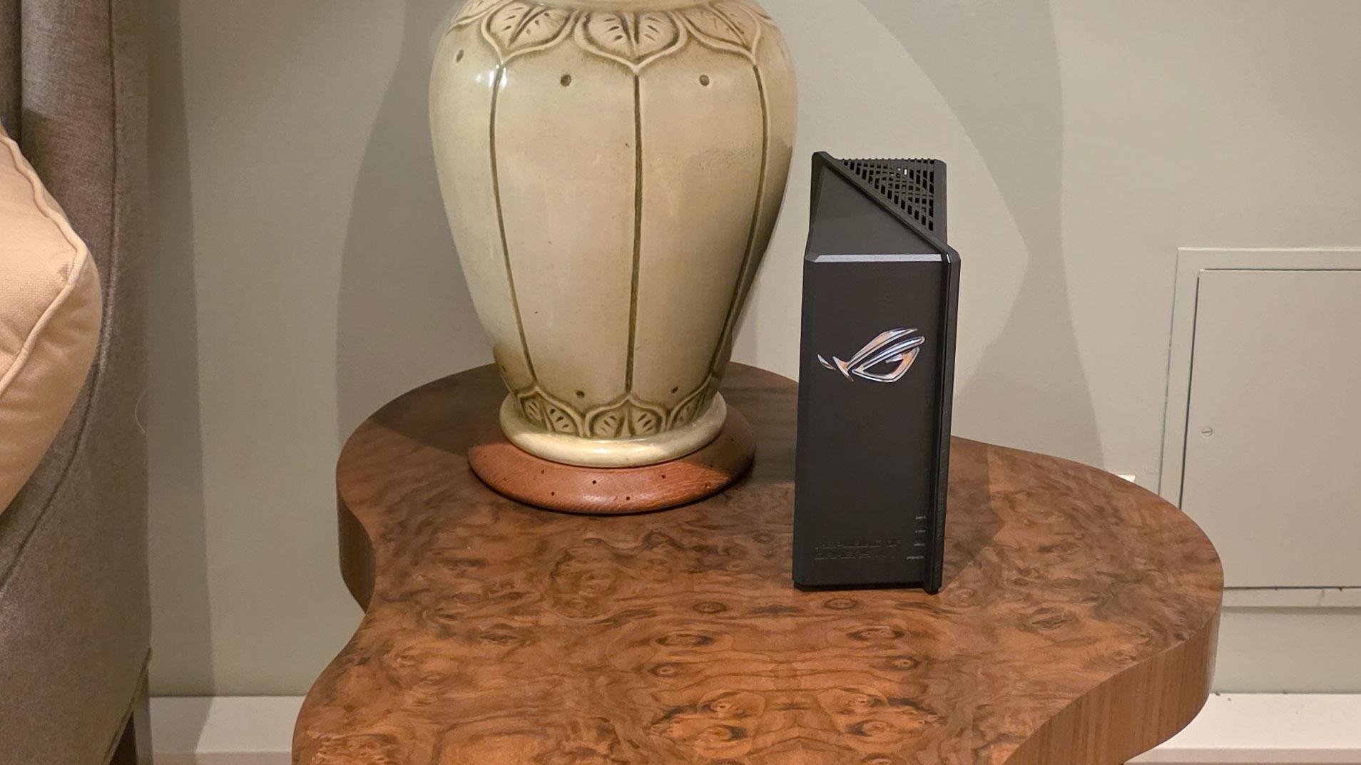 Asus ROG Strix GS-BE18000 gaming router on a table