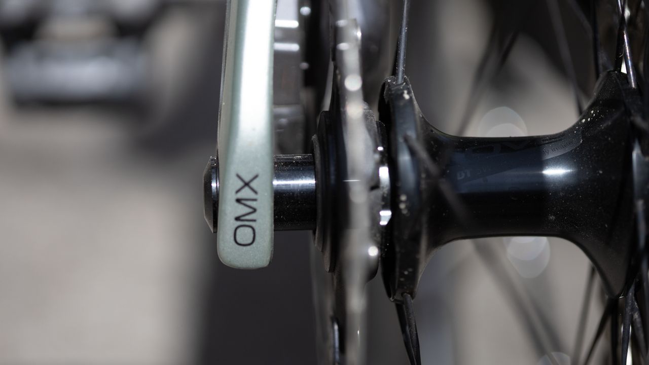Orbea Orca Aero M120iLTD OMX carbon logo