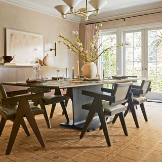 Beige living room with brown table and brown rug