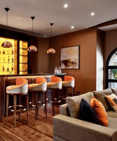 A sensational circular platform hosts the feature dining area offering a sophisticated space to dine in style, with its curves mirrored by beautiful stained glass windows, made by Chiswick Stain Glass, creators of the iconic windows at The Ivy.