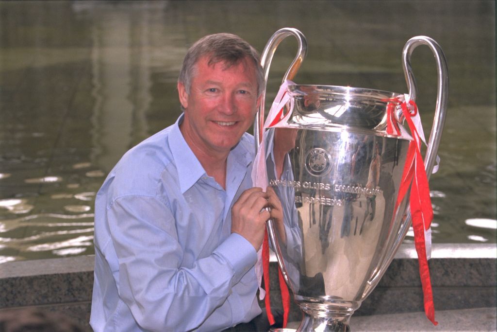 MANCHESTER, ENGLAND - MAY 27: Sir Alex Ferguson with the European Cup the morning after the victory in the UEFA Champions League Final between Bayern Munich v Manchester United at the Nou camp Stadium on 26 May, 1999 in Barcelona, Spain. Bayern Munich 1 Manchester United 2. (Photo by Matthew Peters/Manchester United via Getty Images)