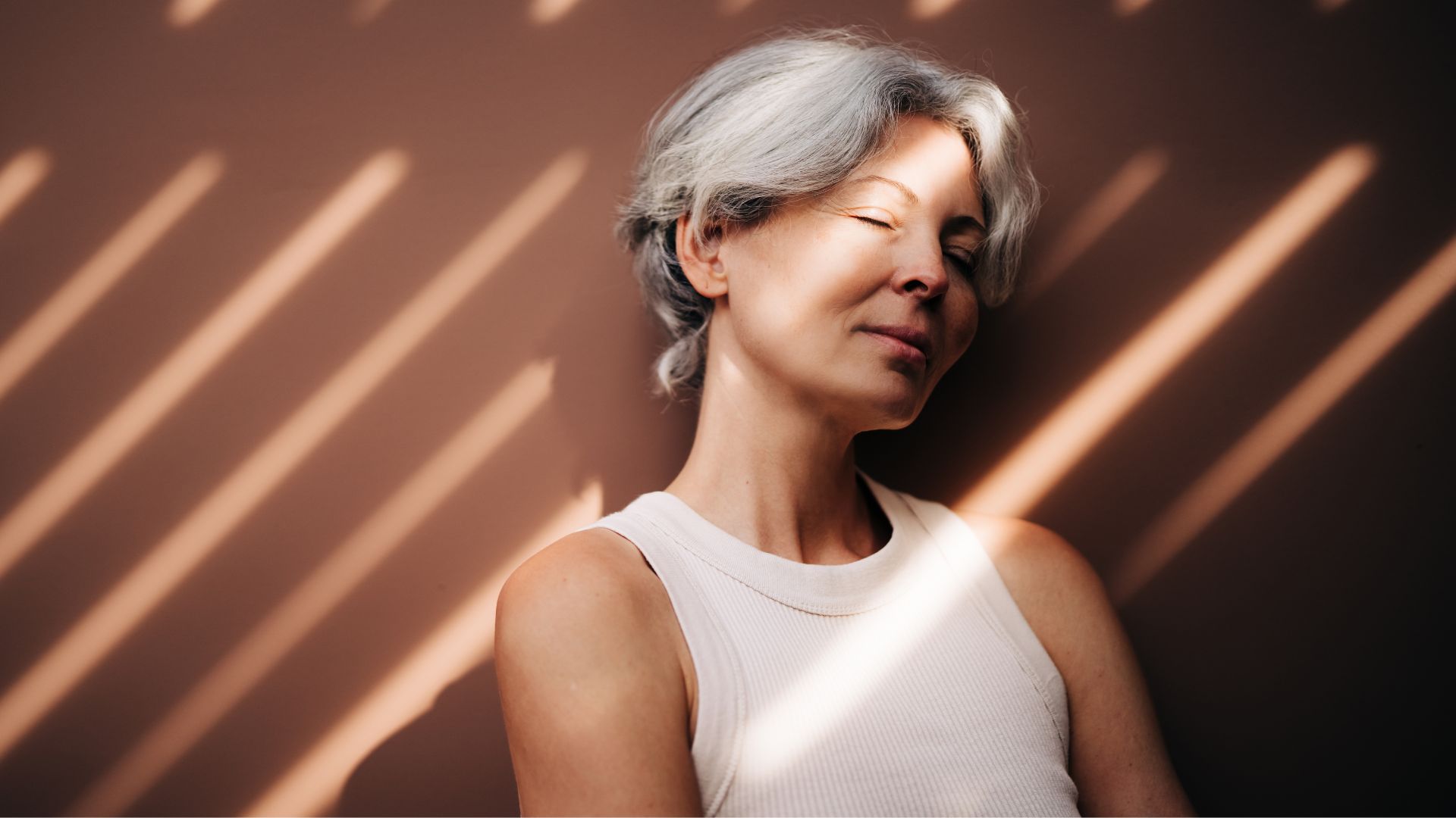 Woman meditating with closed eyes