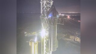 SpaceX CEO Elon Musk unveiled this view of the company's Starship SN20 prototype being attached to its Super Heavy booster near Boca Chica village in South Texas on Feb. 9, 2022 ahead of a project update.