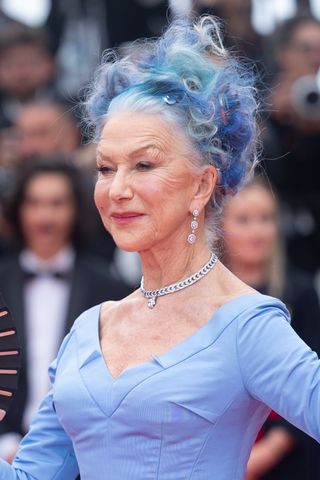 Helen Mirren has blue grey hair whilst attending the "Jeanne du Barry" Screening & opening ceremony red carpet at the 76th annual Cannes film festival at Palais des Festivals on May 16, 2023 in Cannes, France.