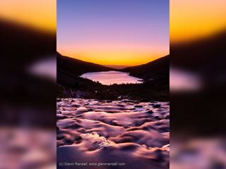 A purple sunrise above Lake Isabelle, Indian Peaks Wilderness, Colorado.