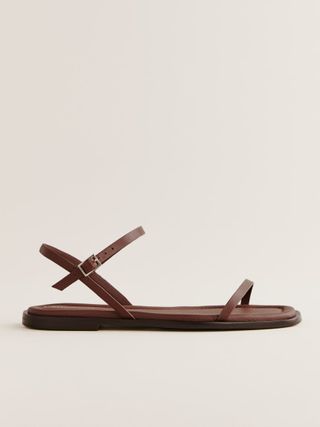 brown flat sandals with two straps