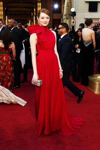 Actress Emma Stone arrives at the 84th Annual Academy Awards held at the Hollywood & Highland Center on February 26, 2012 in Hollywood, California. (Photo by Jeff Vespa/WireImage)