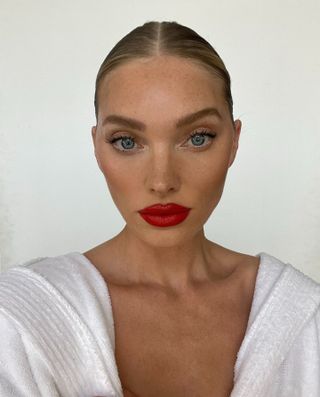 @hoskelsa wearing a bold red lipstick