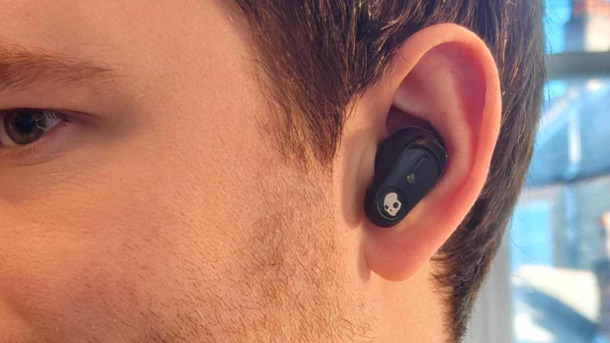 The Skullcandy Method 540 buds, in a man's ear.