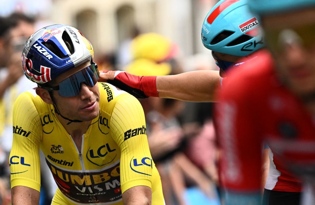 JumboVisma teams Belgian rider Wout Van Aert L reacts after he cycled at the back of the pack to the finish line during the 6th stage of the 109th edition of the Tour de France cycling race 2199 km between Binche in Belgium and Longwy in northern France on July 7 2022 Photo by AnneChristine POUJOULAT AFP Photo by ANNECHRISTINE POUJOULATAFP via Getty Images