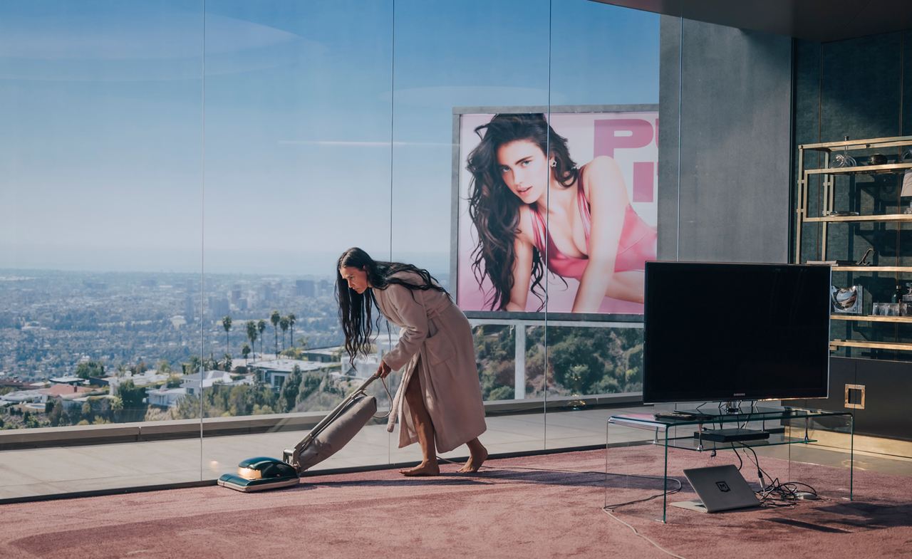 Demi Moore hoovering