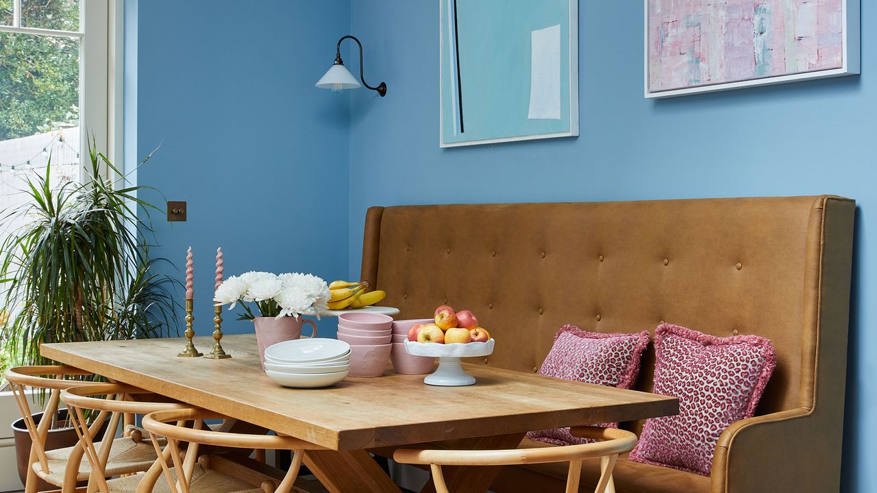 French blue on walls with brown sofa