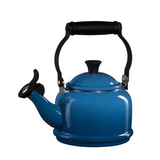 A blue Le Creuset stovetop kettle