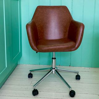 home office with brown desk chair