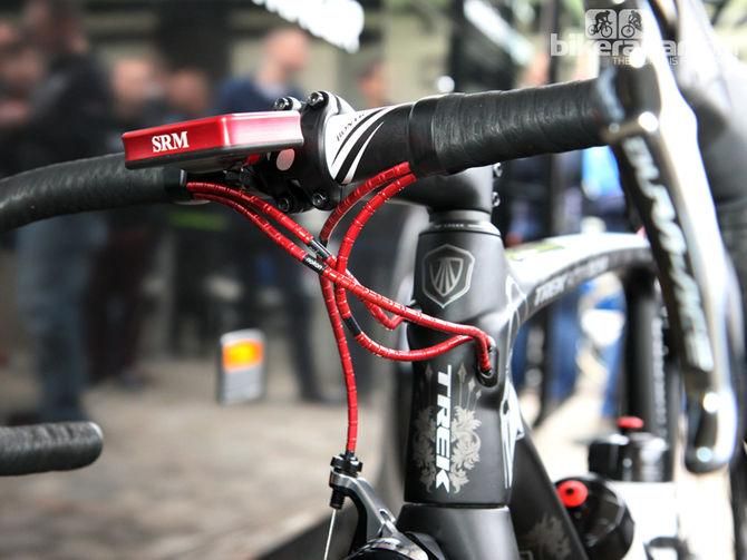 While Fabian Cancellara's (Trek Factory Racing) bikes are often dressed in gold accents, today he left Compi&egrave;gne with red anodized jewelry on his Trek Domane Classics
