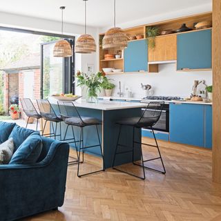open plan kitchen with seating and island unit