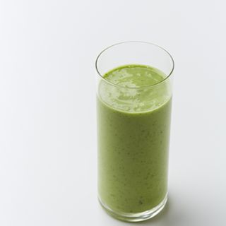 green colour smoothies with white background