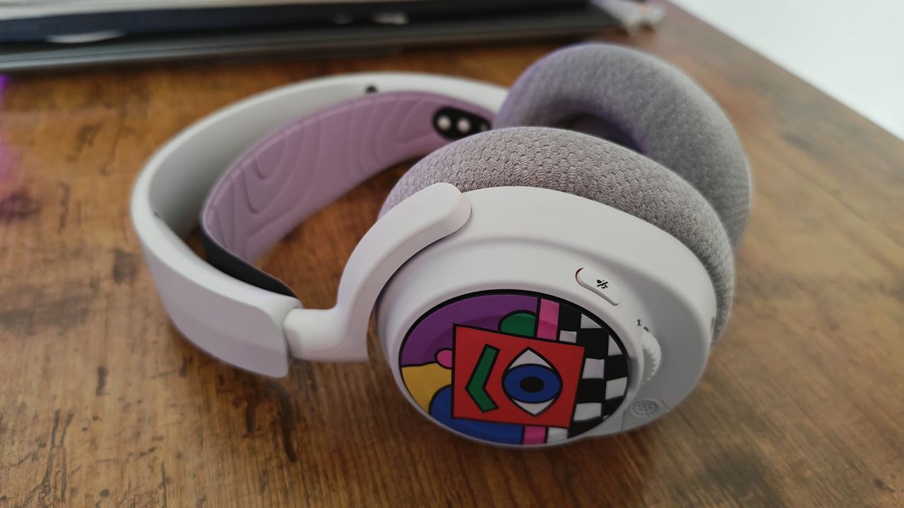 A grey, quarts pink, and special edition combination of accessories on the SteelSeries Arctis Nova 7P