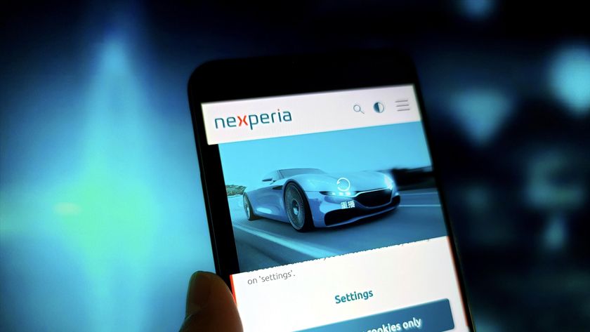 Nexperia logo on a phone with a car image.