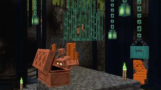 Copper chains handing indoors in Minecraft.