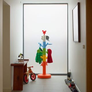 hallway with kids toys and shoes