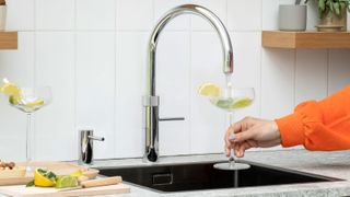 instant boiling water tap dispensing sparkling water