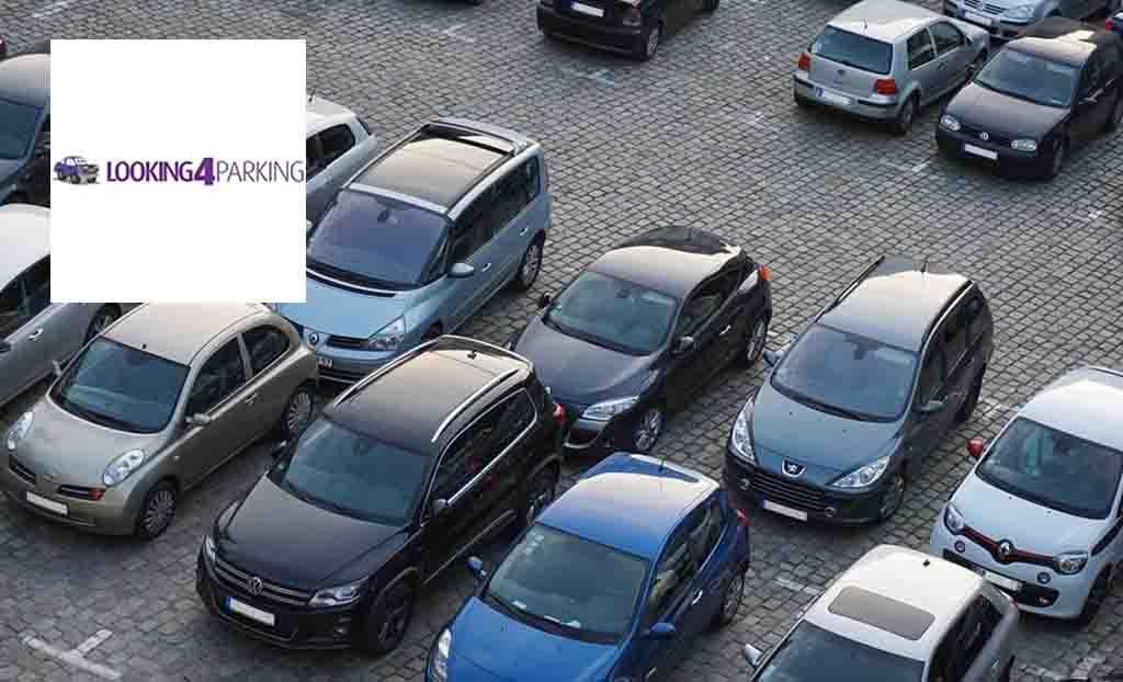 Looking 4 parking logo placed over an image of cars parked in a car park