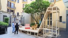 furniture and lighting displayed on timber platform