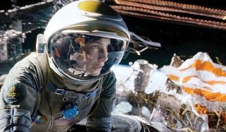 Gravity Sandra Bullock looks at danger ahead