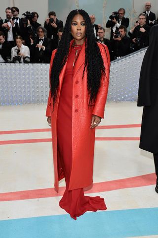 Gabrielle Union in a head to toe red outfit on the Met Gala 2023 red carpet