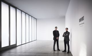 portrait of Jonathan Caplan and Mani Colaku, co-founders of Caplan Colaku Architecture inside Gagosian 541 West 24th Street