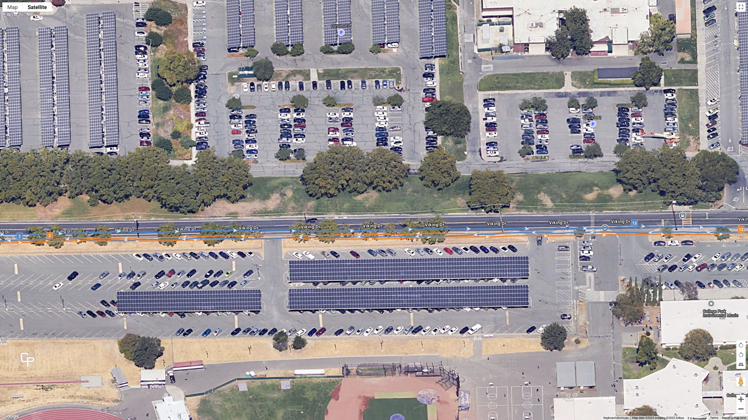 A Google Maps top-down view showing a GPS line for the COROS PACE Pro (orange) and Garmin Fenix 8 (blue)