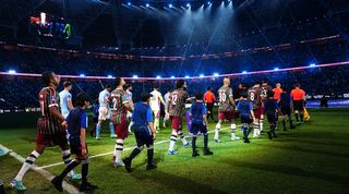 Manchester City and Fluminense players take to the pitch ahead of the FIFA Club World Cup final in Saudi Arabia in December 2023.