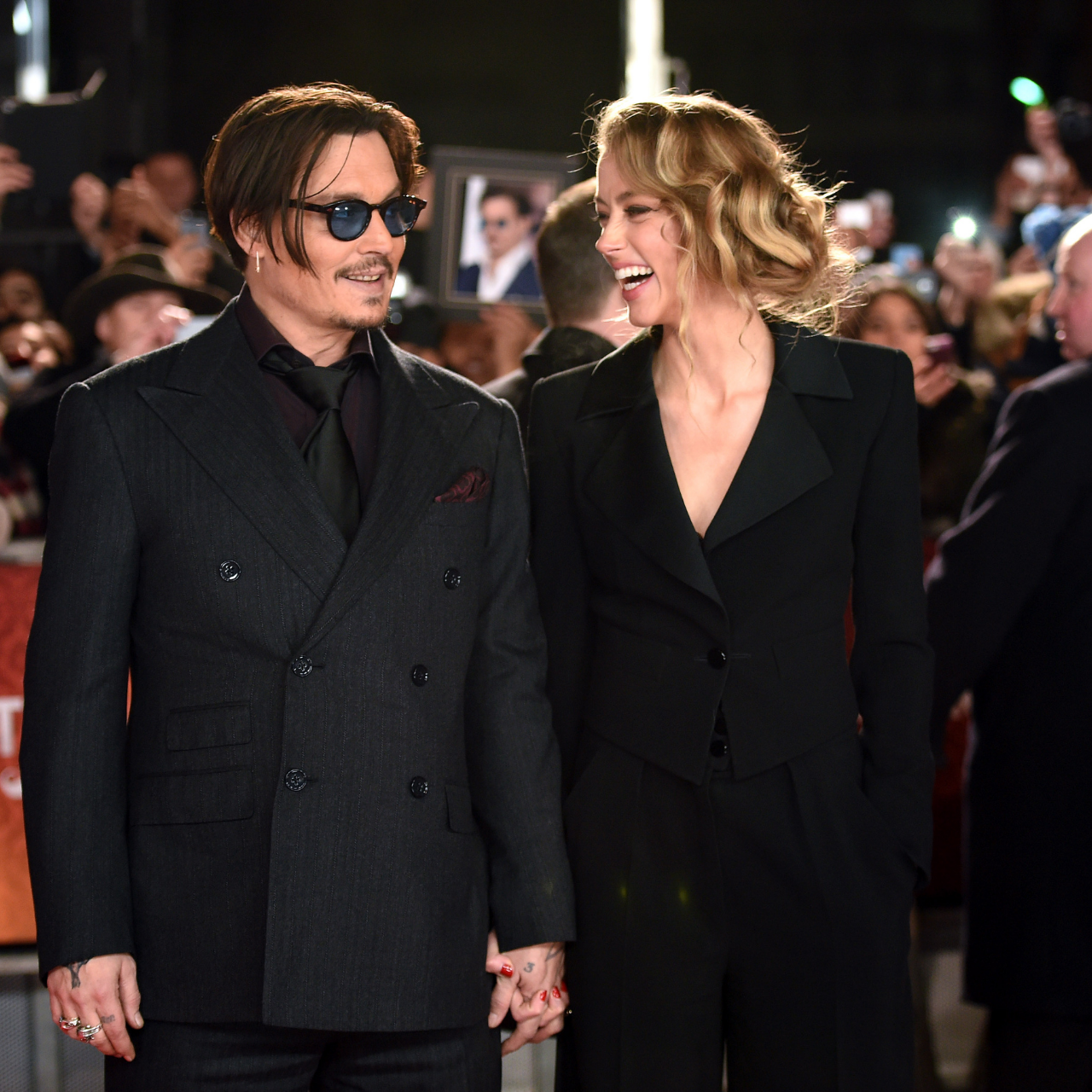 Johnny Depp and Amber Heard attend the premiere of Mortdecai 2015