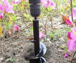 Drill planting tool for bulbs in a border