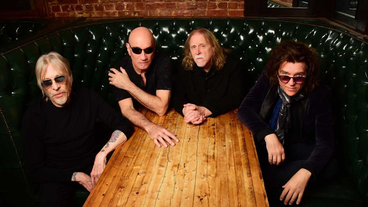 Gov&#039;t Mule sitting at a table