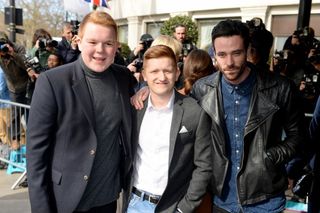 Corrie's Sean Ward with co-stars Colson Smith and Sam Aston at the TRIC awards (Doug Peters/EMPICS)