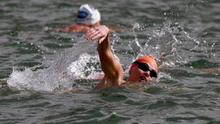 Charlene Wittstock swims during her race in the Iron Man and Physically Challenged Event of the 2011 38th aQuelle Midmar Mile Race at Midmar Mile Dam on February 12, 2011