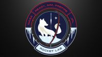 a mission badge showing the white silhouette of an arctic fox against a dark blue background. a white silhouette of a rocket lifts off in the background